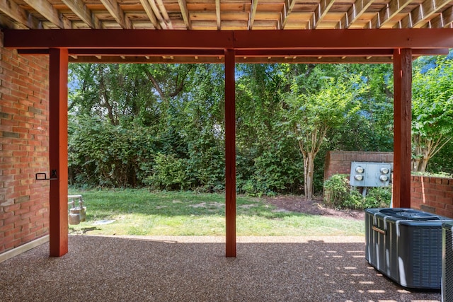 127 Carriage Ct, Brentwood, TN 37027 - doorway to outside with carpet floors and brick wall
