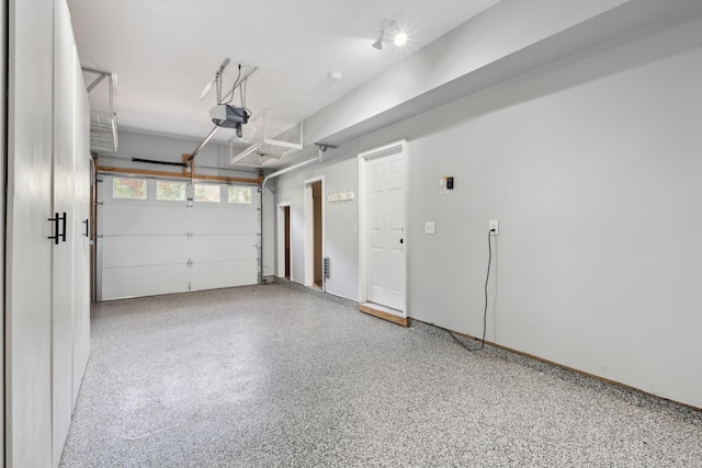 127 Carriage Ct, Brentwood, TN 37027 - garage featuring a garage door opener