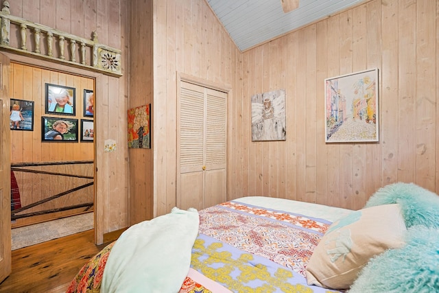2541 Sparkmantown Rd, Doyle, TN 38559 - bedroom with wooden walls, lofted ceiling, wood finished floors, a closet, and wood ceiling