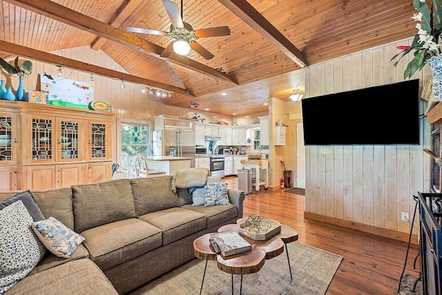 2541 Sparkmantown Rd, Doyle, TN 38559 - living area featuring wooden walls, light wood-style floors, a ceiling fan, and wooden ceiling