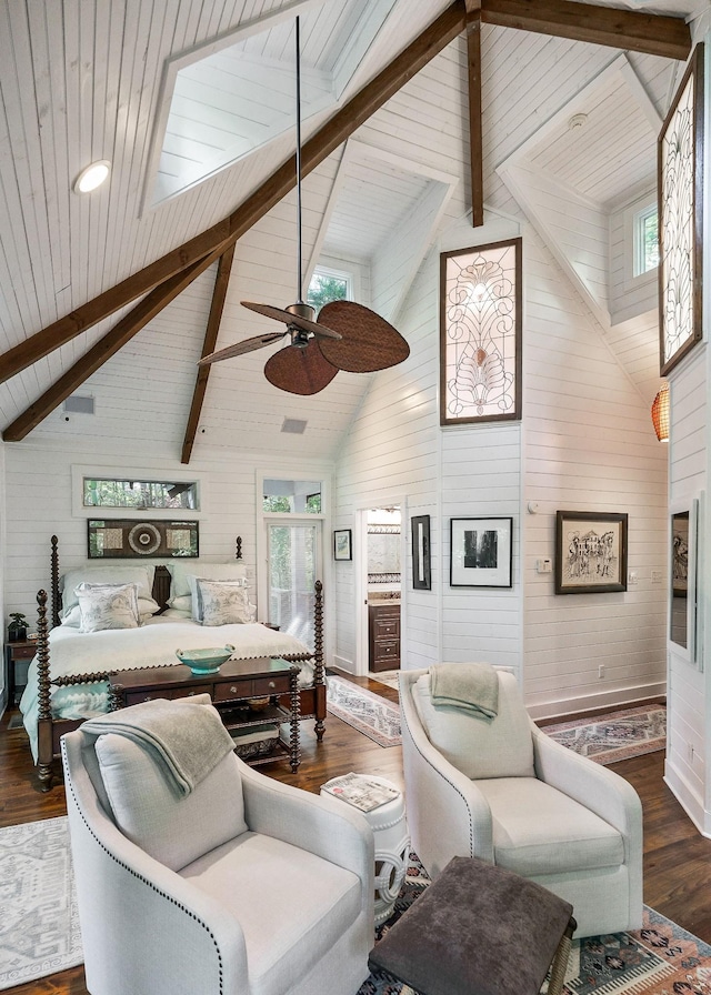 2541 Sparkmantown Rd, Doyle, TN 38559 - living room with wood walls, ceiling fan, high vaulted ceiling, wood finished floors, and a wooden ceiling with exposed beams