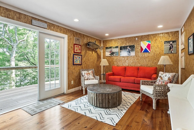 2541 Sparkmantown Rd, Doyle, TN 38559 - living room with wood-type flooring, recessed lighting, and wooden walls