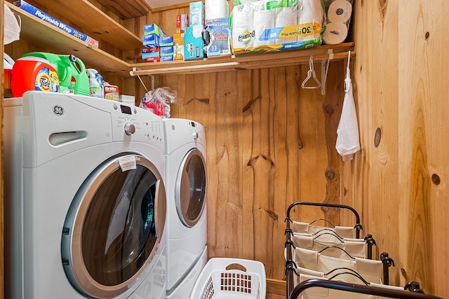 2541 Sparkmantown Rd, Doyle, TN 38559 - laundry area featuring separate washer and dryer and wood walls
