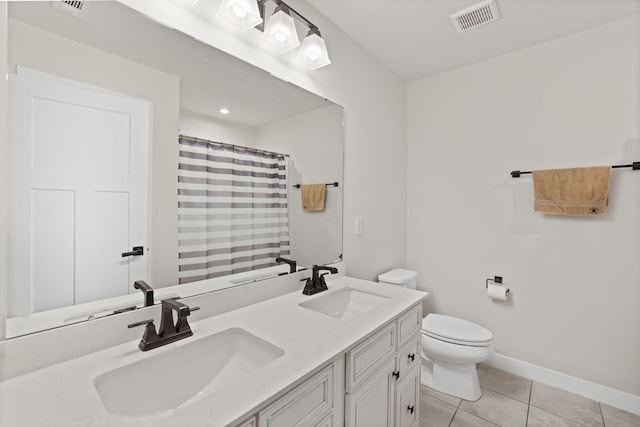3067 Boxbury Ln, Spring Hill, TN 37174 - bathroom featuring double vanity, tile patterned floors, and curtained shower