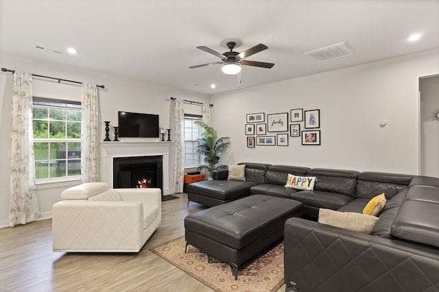 3067 Boxbury Ln, Spring Hill, TN 37174 - living area with plenty of natural light, ceiling fan, light wood-style flooring, a lit fireplace, and recessed lighting