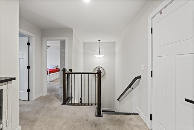3067 Boxbury Ln, Spring Hill, TN 37174 - hallway with an upstairs landing and carpet floors