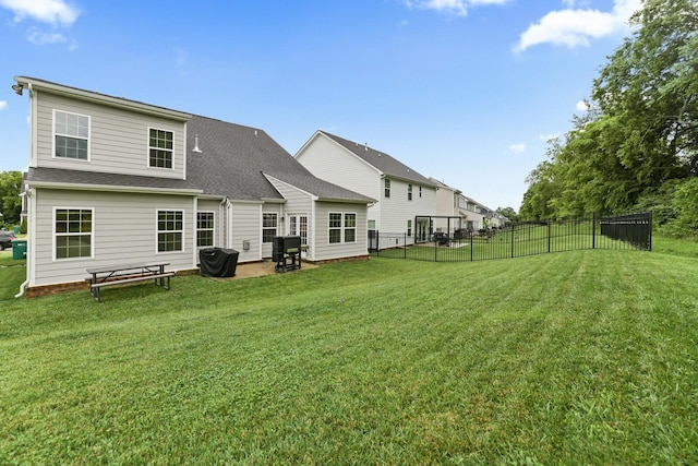 3067 Boxbury Ln, Spring Hill, TN 37174 - rear view of property with a shingled roof and a patio area
