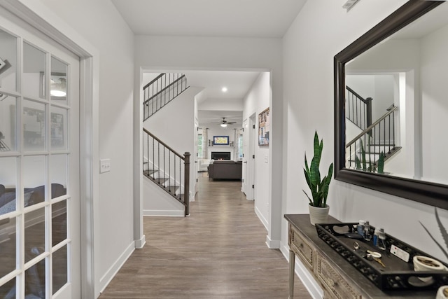 3067 Boxbury Ln, Spring Hill, TN 37174 - corridor featuring stairway, wood finished floors, and recessed lighting