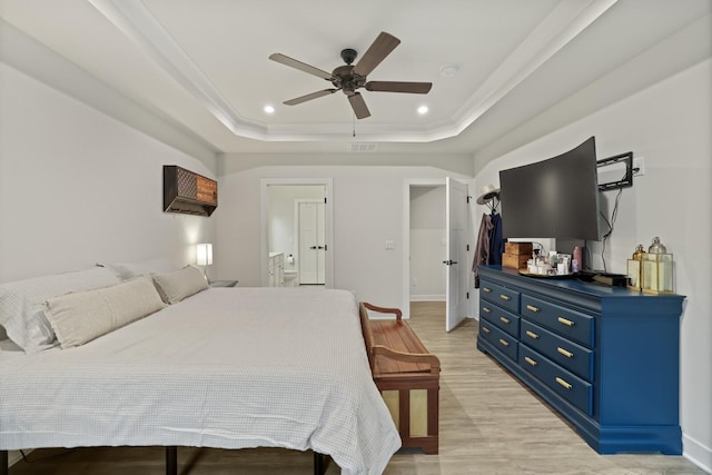 3067 Boxbury Ln, Spring Hill, TN 37174 - bedroom featuring light wood-style flooring, a tray ceiling, recessed lighting, ceiling fan, and ensuite bath