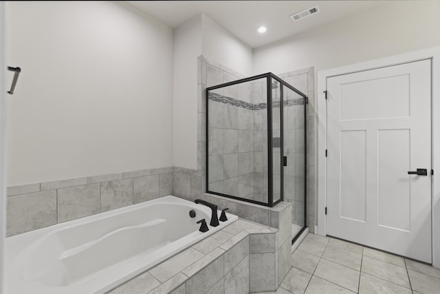 3067 Boxbury Ln, Spring Hill, TN 37174 - full bath with a garden tub, a stall shower, tile patterned flooring, and recessed lighting
