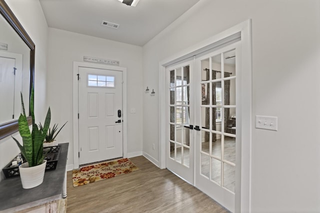 3067 Boxbury Ln, Spring Hill, TN 37174 - foyer entrance with french doors and wood finished floors