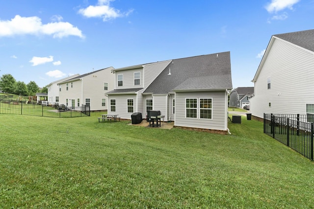 3067 Boxbury Ln, Spring Hill, TN 37174 - rear view of property with a shingled roof, a fenced backyard, and a patio