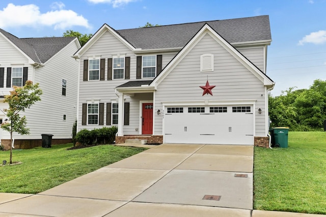 3067 Boxbury Ln, Spring Hill, TN 37174 - traditional-style house featuring an attached garage, concrete driveway, and a front lawn