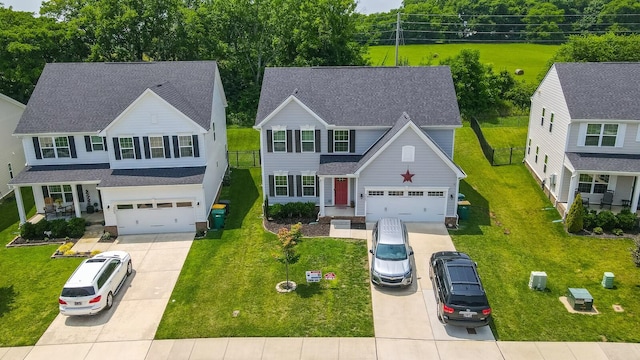 3067 Boxbury Ln, Spring Hill, TN 37174 - view of front of home featuring driveway, roof with shingles, and a front lawn