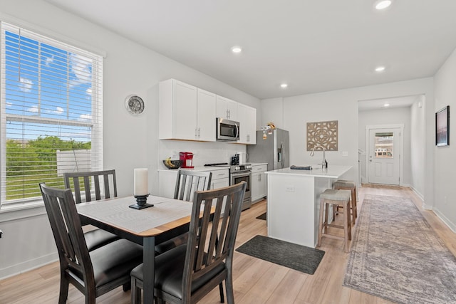 755 Mickelson Way, Lebanon, TN 37087 - dining area with light wood finished floors and recessed lighting