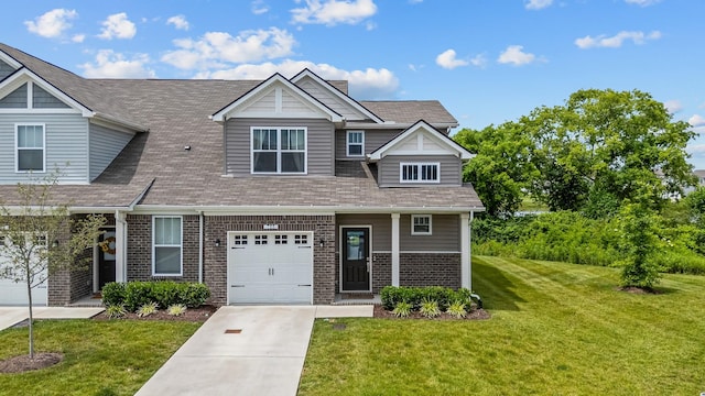 755 Mickelson Way, Lebanon, TN 37087 - view of front of home featuring brick siding, a front lawn, concrete driveway, and a shingled roof