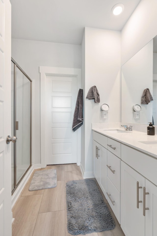 755 Mickelson Way, Lebanon, TN 37087 - full bathroom with a stall shower, double vanity, and wood finished floors