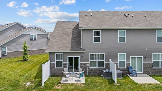 755 Mickelson Way, Lebanon, TN 37087 - rear view of house featuring a patio area, a fenced backyard, brick siding, and roof with shingles