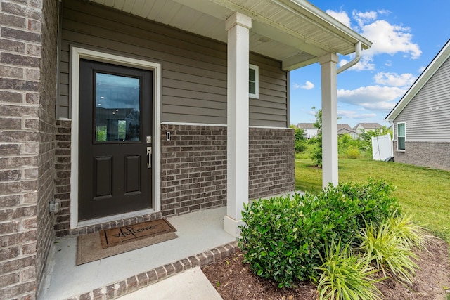 755 Mickelson Way, Lebanon, TN 37087 - doorway to property featuring brick siding and a yard