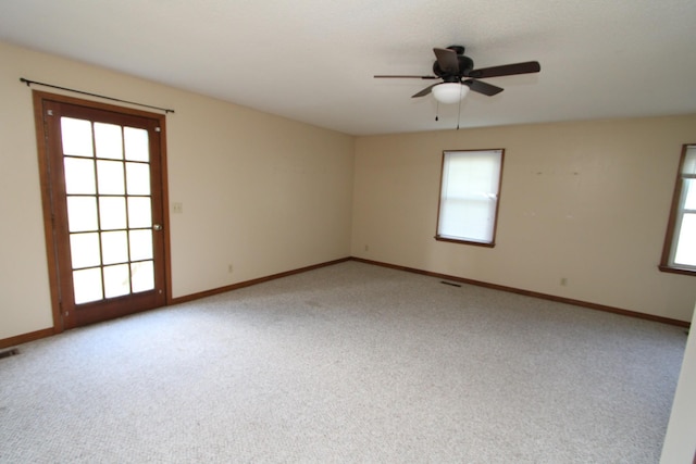 680 Oak Grove Rd, Goodspring, TN 38460 - carpeted spare room with a ceiling fan and baseboards