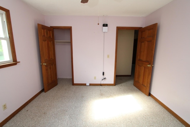 680 Oak Grove Rd, Goodspring, TN 38460 - unfurnished bedroom featuring baseboards, carpet flooring, and a closet