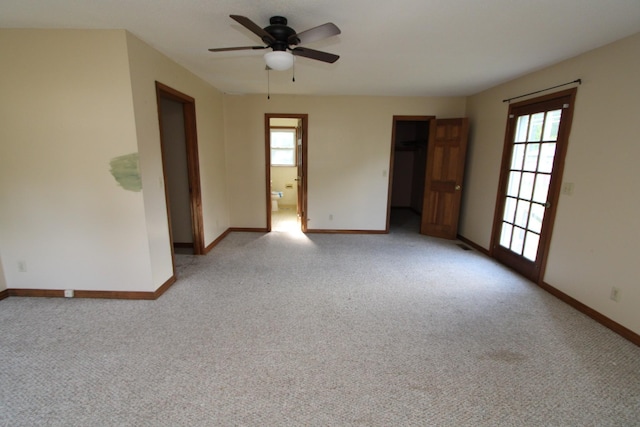 680 Oak Grove Rd, Goodspring, TN 38460 - empty room with baseboards, light carpet, and ceiling fan