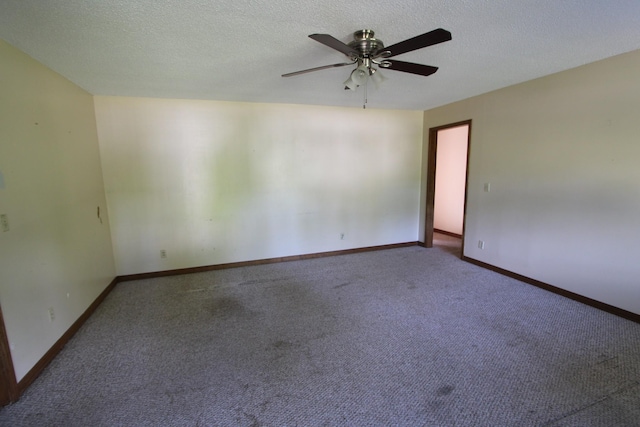 680 Oak Grove Rd, Goodspring, TN 38460 - carpeted spare room with a ceiling fan, baseboards, and a textured ceiling