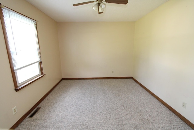 680 Oak Grove Rd, Goodspring, TN 38460 - spare room with ceiling fan, light colored carpet, and baseboards