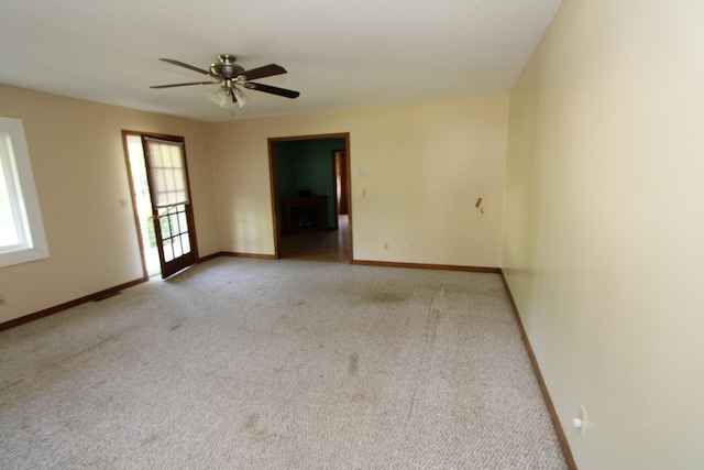 680 Oak Grove Rd, Goodspring, TN 38460 - empty room with carpet floors, baseboards, and ceiling fan