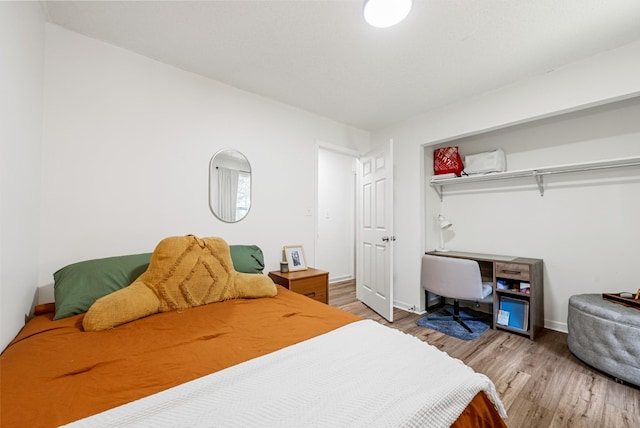 2930 Charlie Sleigh Rd, Woodlawn, TN 37191 - bedroom with wood finished floors and a desk