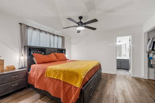 2930 Charlie Sleigh Rd, Woodlawn, TN 37191 - bedroom with wood finished floors, ensuite bathroom, and a ceiling fan