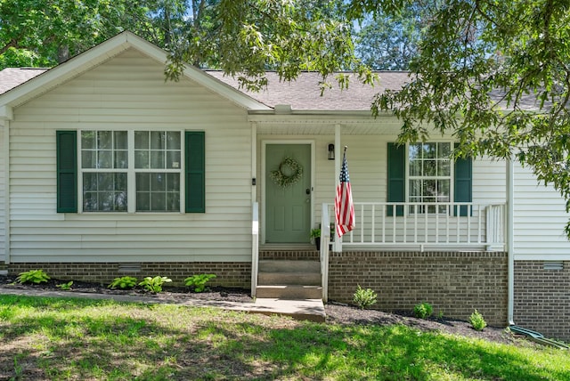 2930 Charlie Sleigh Rd, Woodlawn, TN 37191 - view of front of property with a porch, roof with shingles, and crawl space