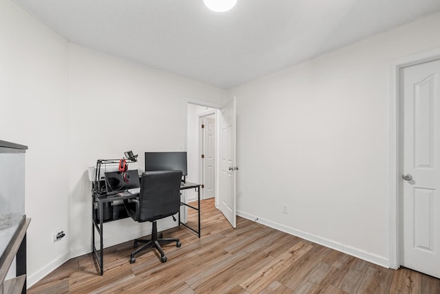 2930 Charlie Sleigh Rd, Woodlawn, TN 37191 - home office with light wood-type flooring and baseboards