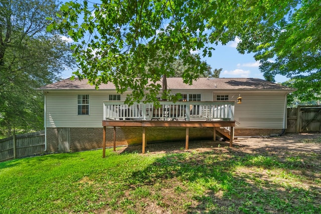 2930 Charlie Sleigh Rd, Woodlawn, TN 37191 - rear view of house featuring a wooden deck and a gate