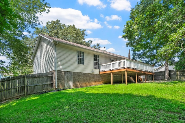 2930 Charlie Sleigh Rd, Woodlawn, TN 37191 - back of house with a wooden deck, a fenced backyard, and brick siding