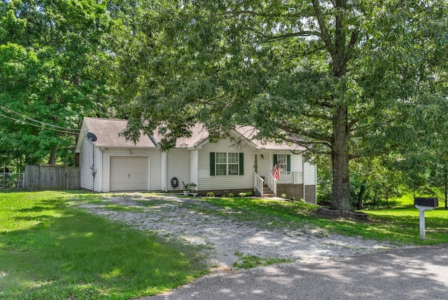 2930 Charlie Sleigh Rd, Woodlawn, TN 37191 - view of front of home with driveway and a garage