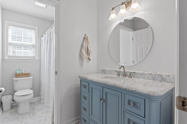 6523 Brigade Ln, Hixson, TN 37343 - full bath featuring marble look tiles, vanity, toilet, and baseboards
