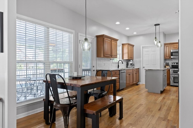 6523 Brigade Ln, Hixson, TN 37343 - dining room featuring plenty of natural light, light wood-style flooring, baseboards, and recessed lighting