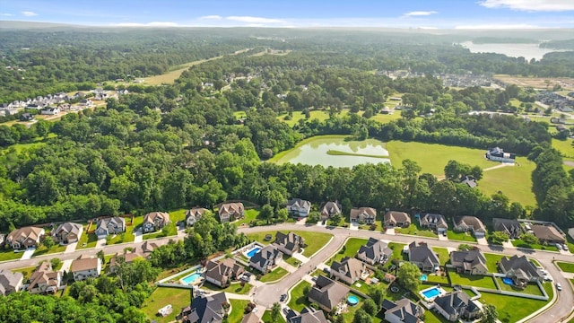 6523 Brigade Ln, Hixson, TN 37343 - aerial view of property's location featuring a heavily wooded area, a nearby body of water, and nearby suburban area