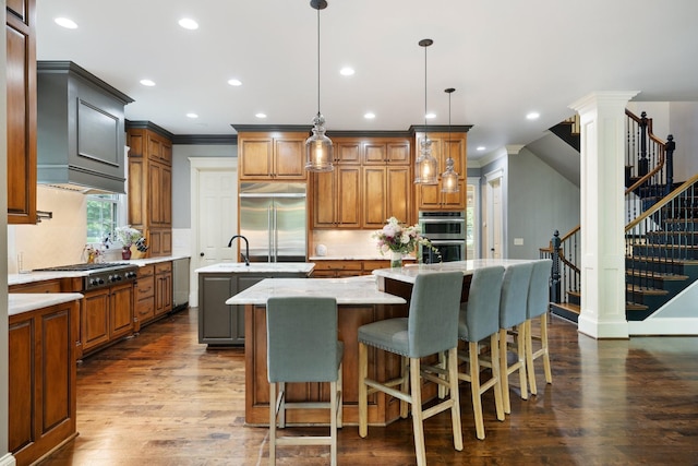 8255 Jamie Ct, Brentwood, TN 37027 - kitchen with an island with sink, stainless steel appliances, dark wood-style floors, recessed lighting, and tasteful backsplash