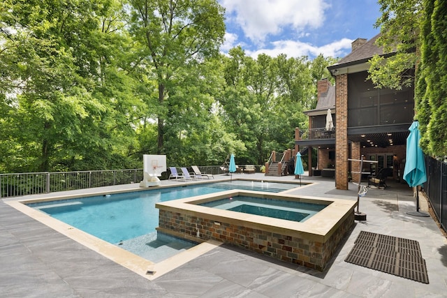 8255 Jamie Ct, Brentwood, TN 37027 - view of pool featuring an in-ground hot tub, a patio, stairway, and view of scattered trees
