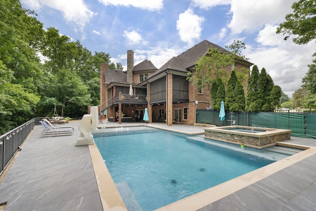 8255 Jamie Ct, Brentwood, TN 37027 - view of pool featuring a patio, a pool with connected hot tub, and a deck
