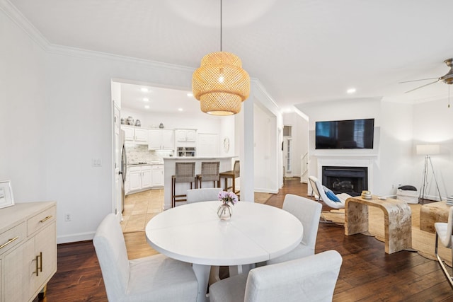 641 Old Hickory Blvd Unit 35, Brentwood, TN 37027 - dining room featuring ceiling fan, crown molding, wood finished floors, recessed lighting, and a fireplace
