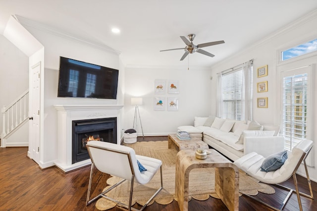 641 Old Hickory Blvd Unit 35, Brentwood, TN 37027 - living room with ceiling fan, crown molding, dark wood-style flooring, a warm lit fireplace, and baseboards