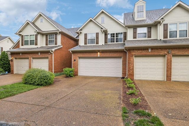 641 Old Hickory Blvd Unit 35, Brentwood, TN 37027 - townhome / multi-family property featuring a garage, brick siding, and concrete driveway