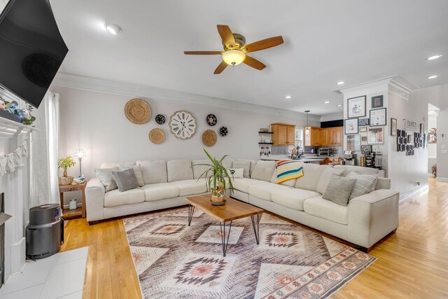 2988 Barnstable Ct, Murfreesboro, TN 37127 - living room with ceiling fan, ornamental molding, recessed lighting, and light wood-style floors