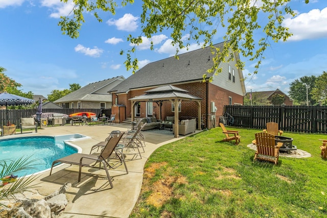 2988 Barnstable Ct, Murfreesboro, TN 37127 - rear view of house with an outdoor living space with a fire pit, brick siding, a gazebo, and a patio area
