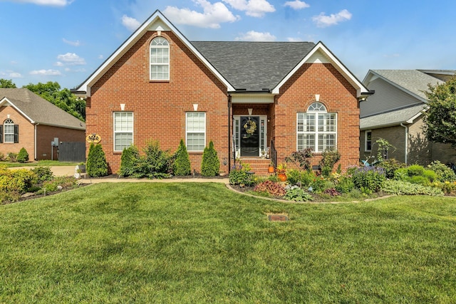2988 Barnstable Ct, Murfreesboro, TN 37127 - traditional-style house with brick siding, a front yard, and roof with shingles