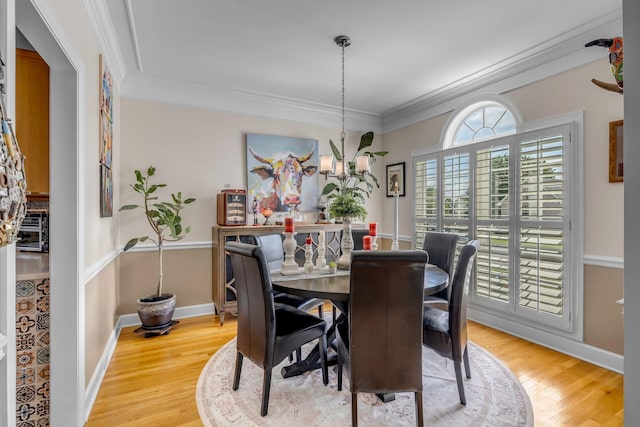 2988 Barnstable Ct, Murfreesboro, TN 37127 - dining room with light wood-style floors, ornamental molding, a chandelier, and baseboards
