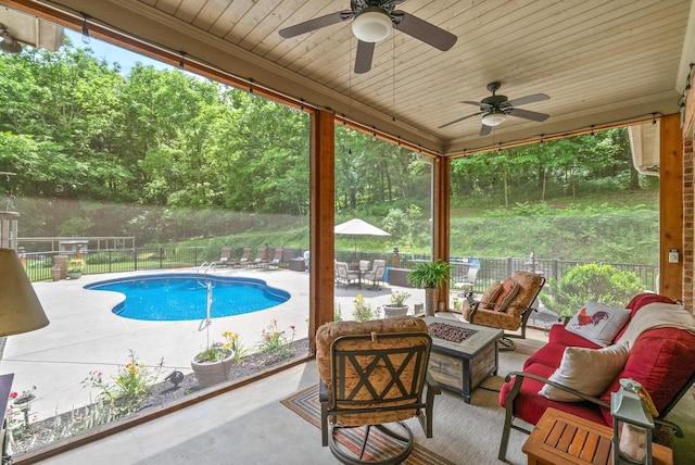 6779 Arno Allisona Rd, College Grove, TN 37046 - view of swimming pool with an outdoor living space with a fire pit, a patio area, a fenced backyard, and a ceiling fan